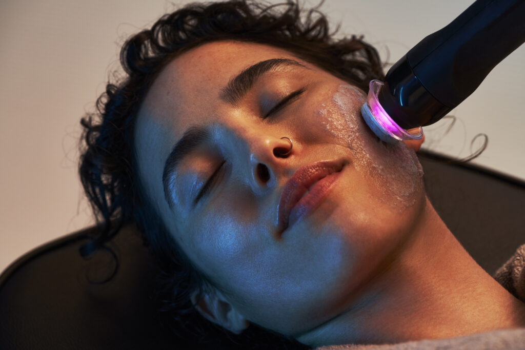 Woman recieving a Glo2Facial treatment in El Paso